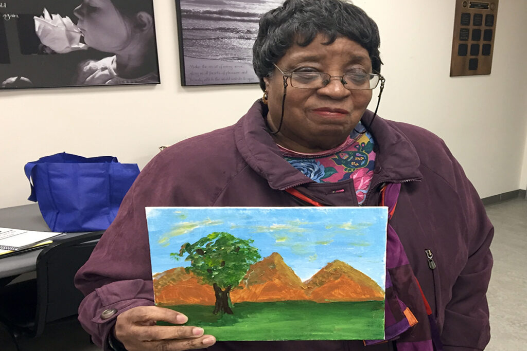 Picture of a client and art that she created