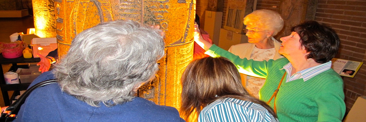 Clients participating in a museum touch tour