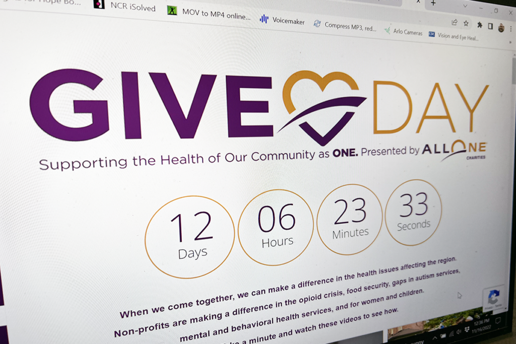 Photo of a computer screen showing the AllOne Charities Give Day 2022 website