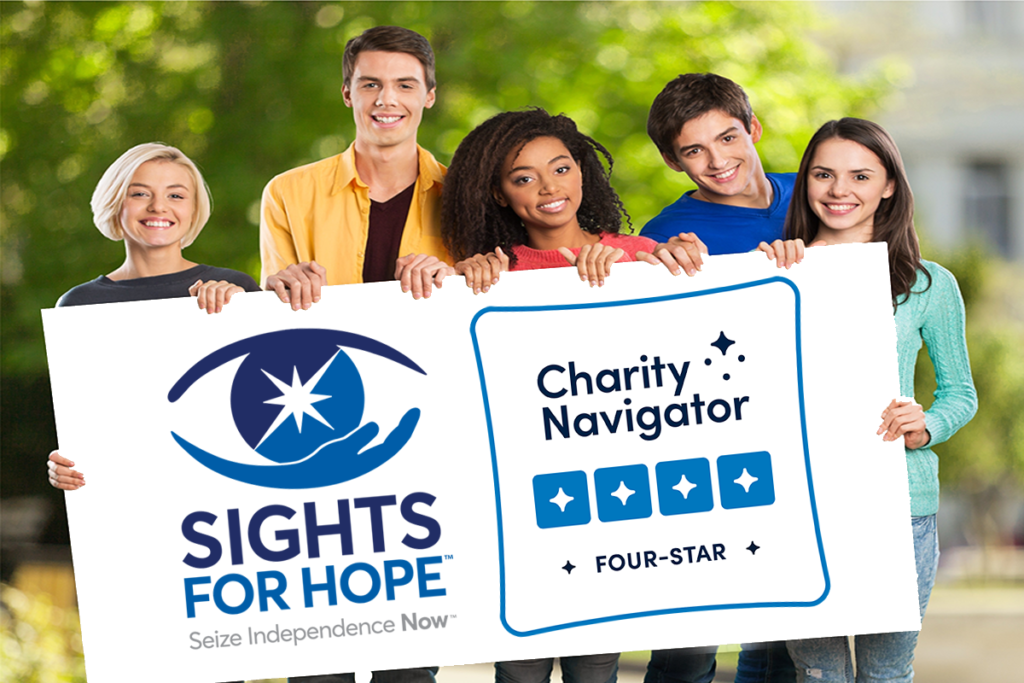 Photo of a diverse group of people holding a sign displaying Sights for Hope's logo and its four-star rating from Charity Navigator