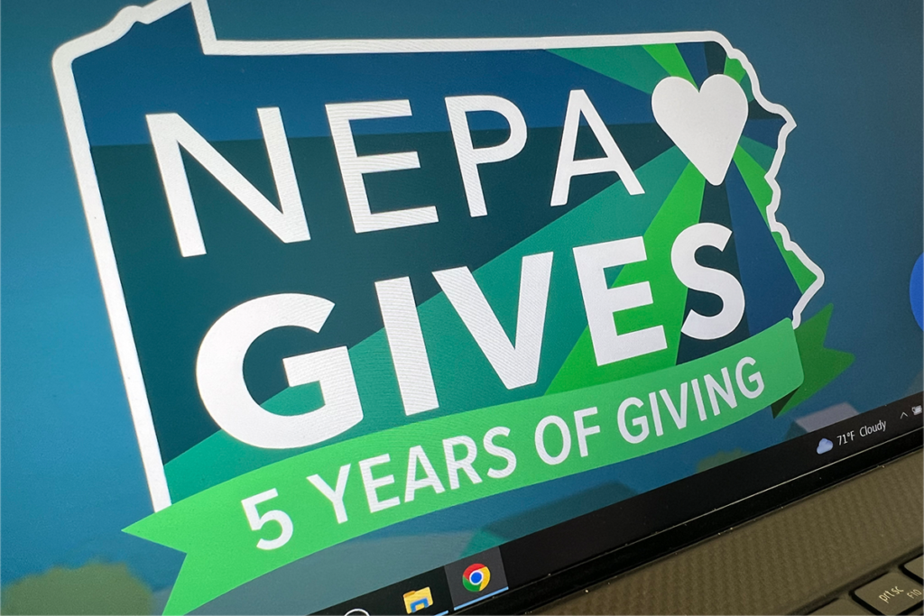 The NEPA Gives 2024 logo with the with the words "Five Years of Giving" on a computer screen