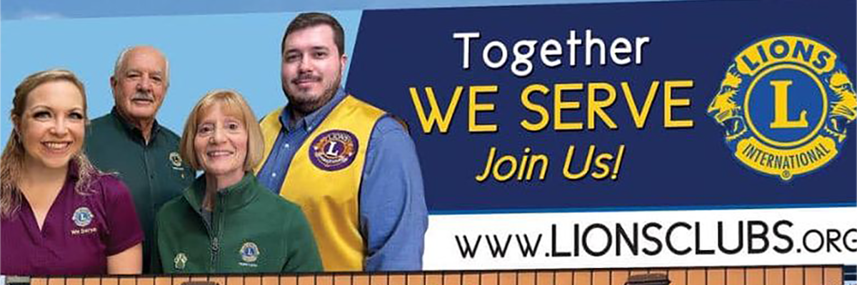 An outdoor billboard picturing four Lions club members along with the words "Together We Serve. Join Us!" the Lions International log, and the URL LionsClubs.org
