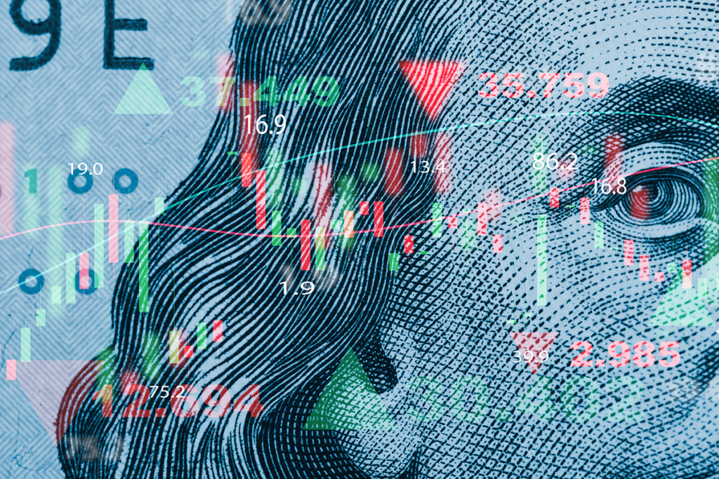 Financial data with a banknote background with an overlay of stock market graphs and numbers in red and green.
