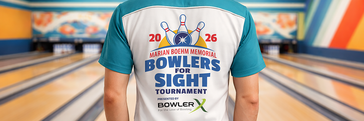 A person wearing an aqua blue and white bowling shirt stands in a bowling alley. The back of the shirt shows a logo that reads "2026 Marian Boehm Memorial Bowlers for Sight Tournament. Presented by BowlerX."