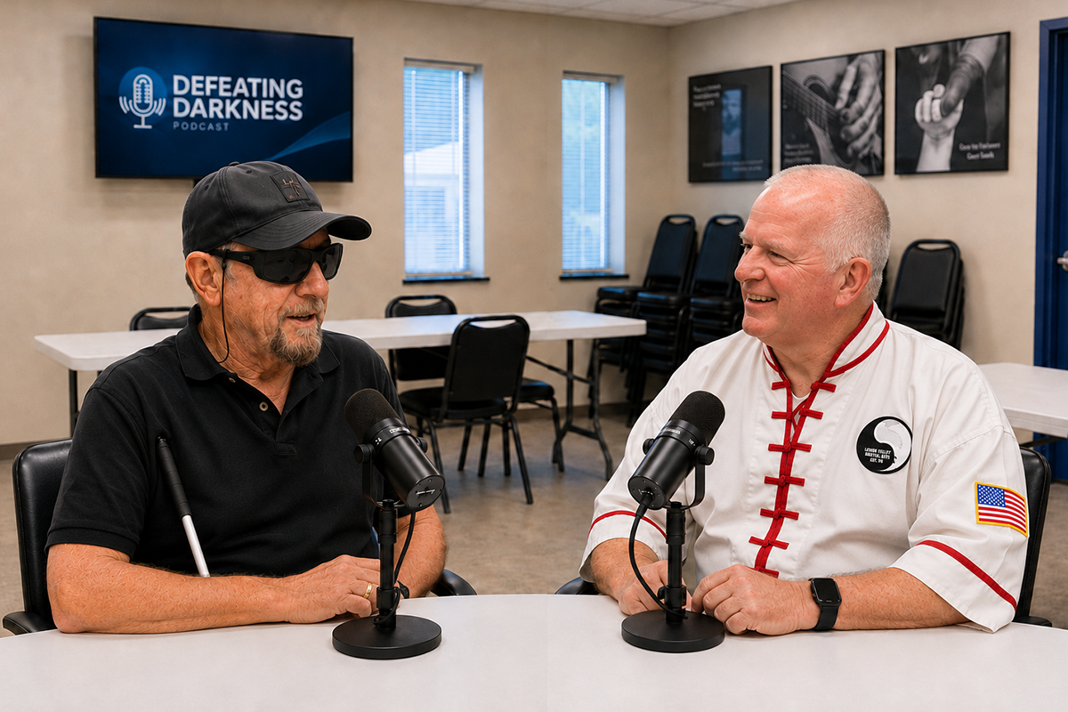 Promotional image of Defeating Darkness podcast host David Rimberg, Ph.D., and co-host Paul Miller seated across from each other at a table with microphones.