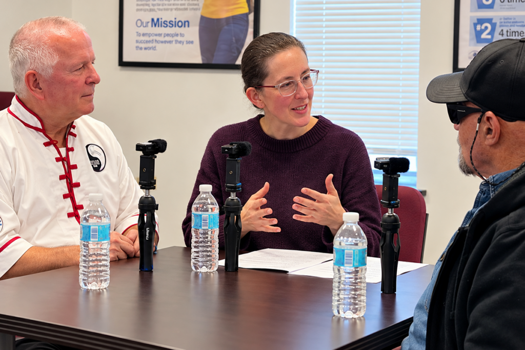 Promotional image of the Defeating Darkness podcast, featuring, from left, co-host Paul Miller, guest Nadya Krause, Sights for Hope's Orientation & Mobility Specialist, and host David Rimberg, Ph.D.